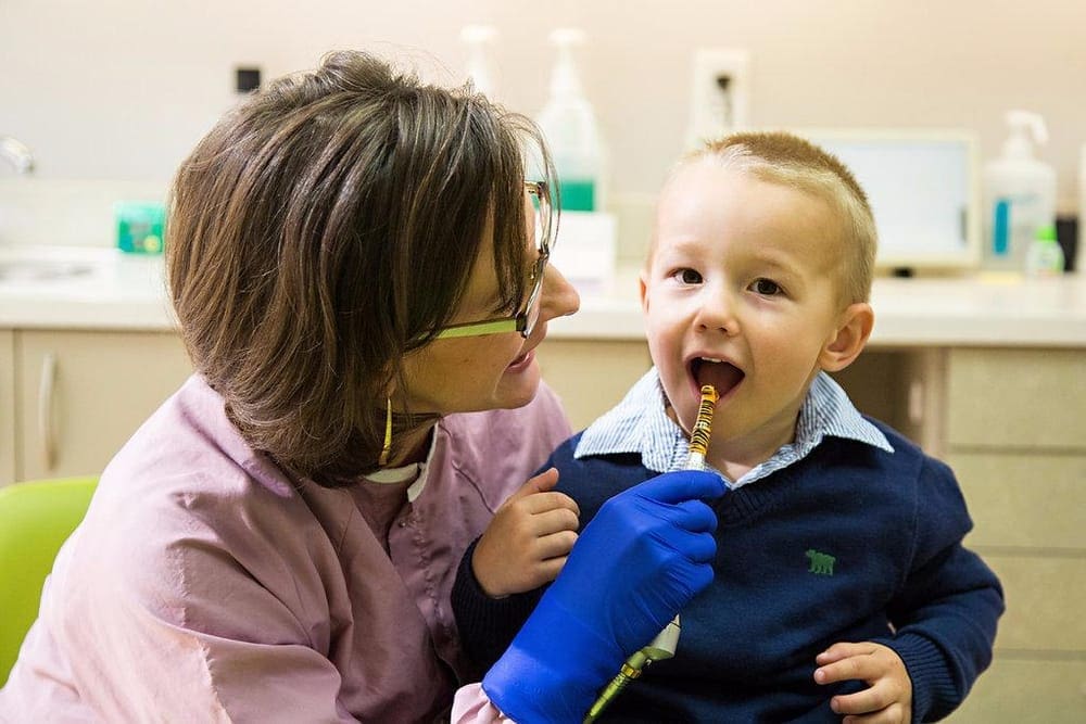 Dr Ford with a kid patient